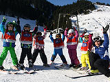Childres´s group with ski instructor Mariella
